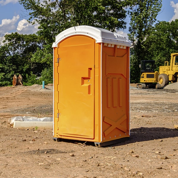 what is the cost difference between standard and deluxe portable restroom rentals in Milroy Indiana